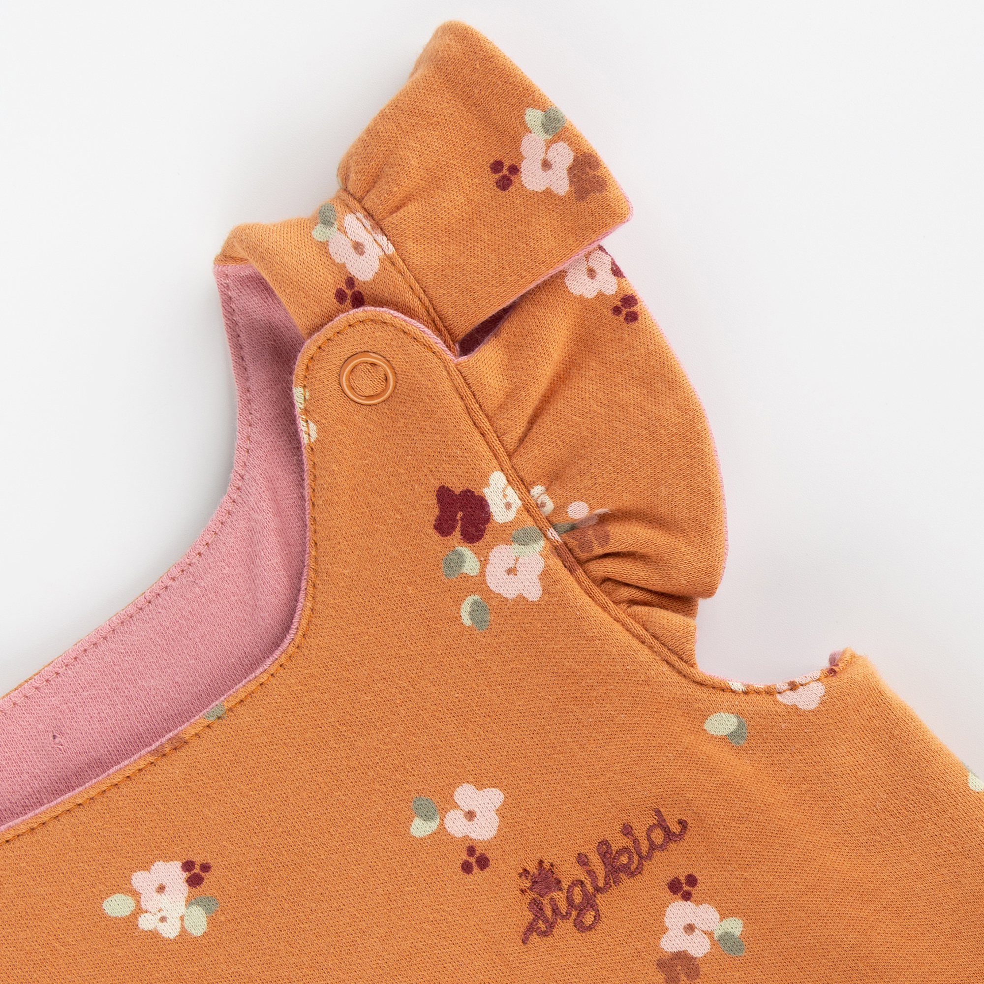 Baby Wendekleid, Blümchen Print und rosa Baby Wendekleid, Blümchen Print und rosa