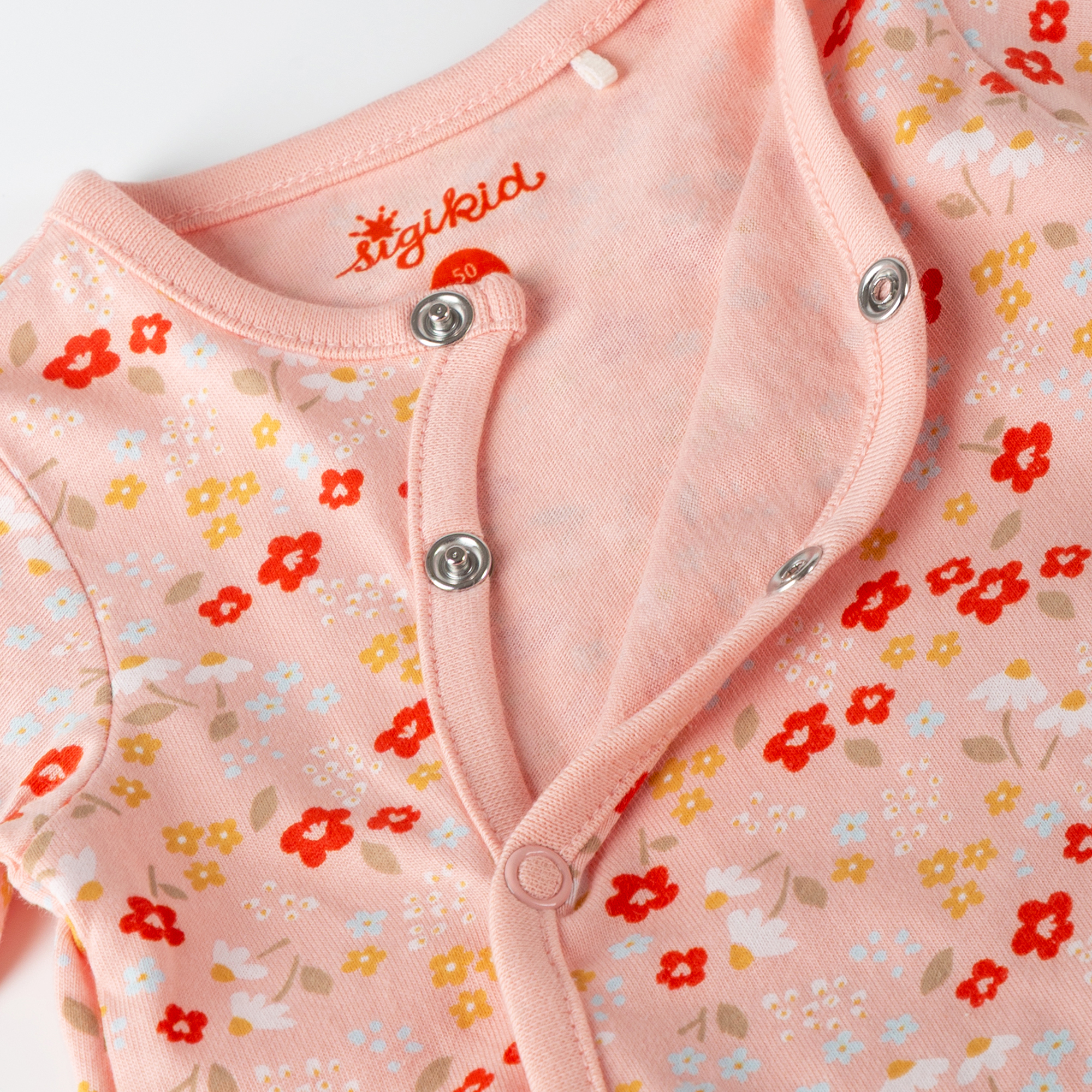 Flowery newborn baby footed romper, long sleeves