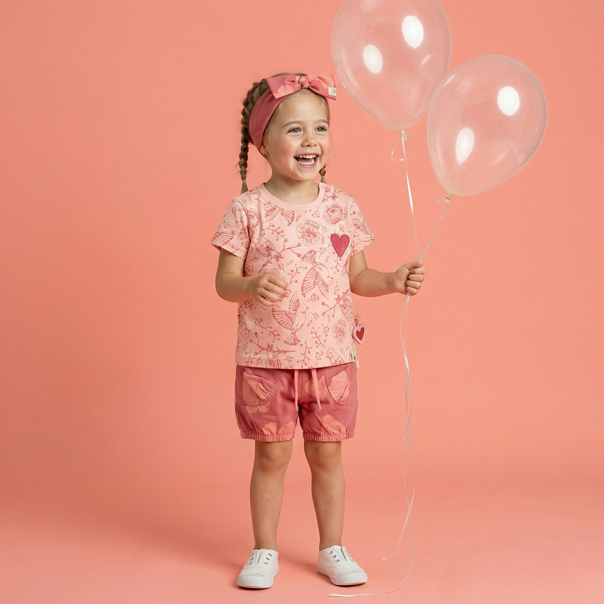 Baby Shorts mit Herzchen Print, rosarot