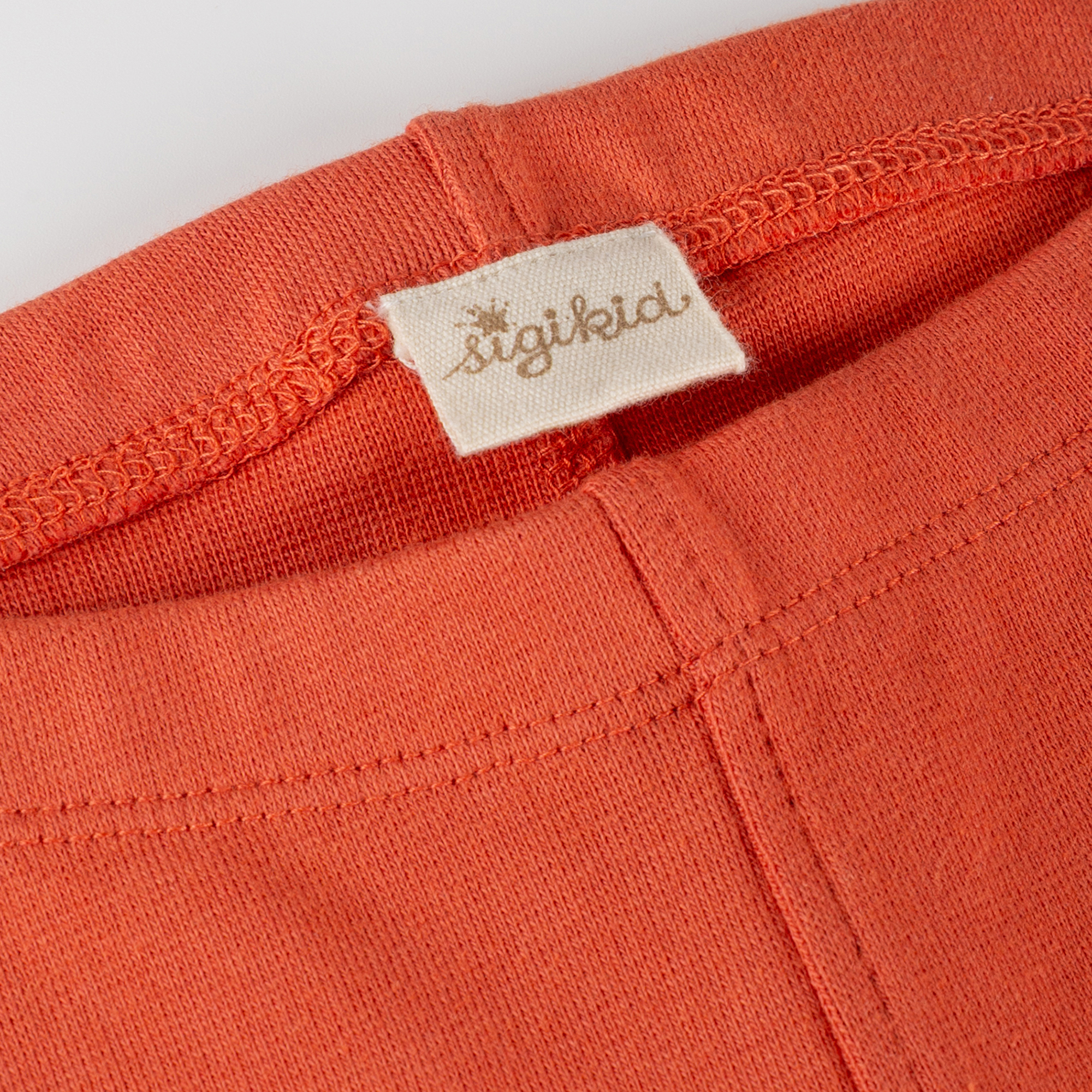 Kinder Capri Leggings seitlich gerafft, orange