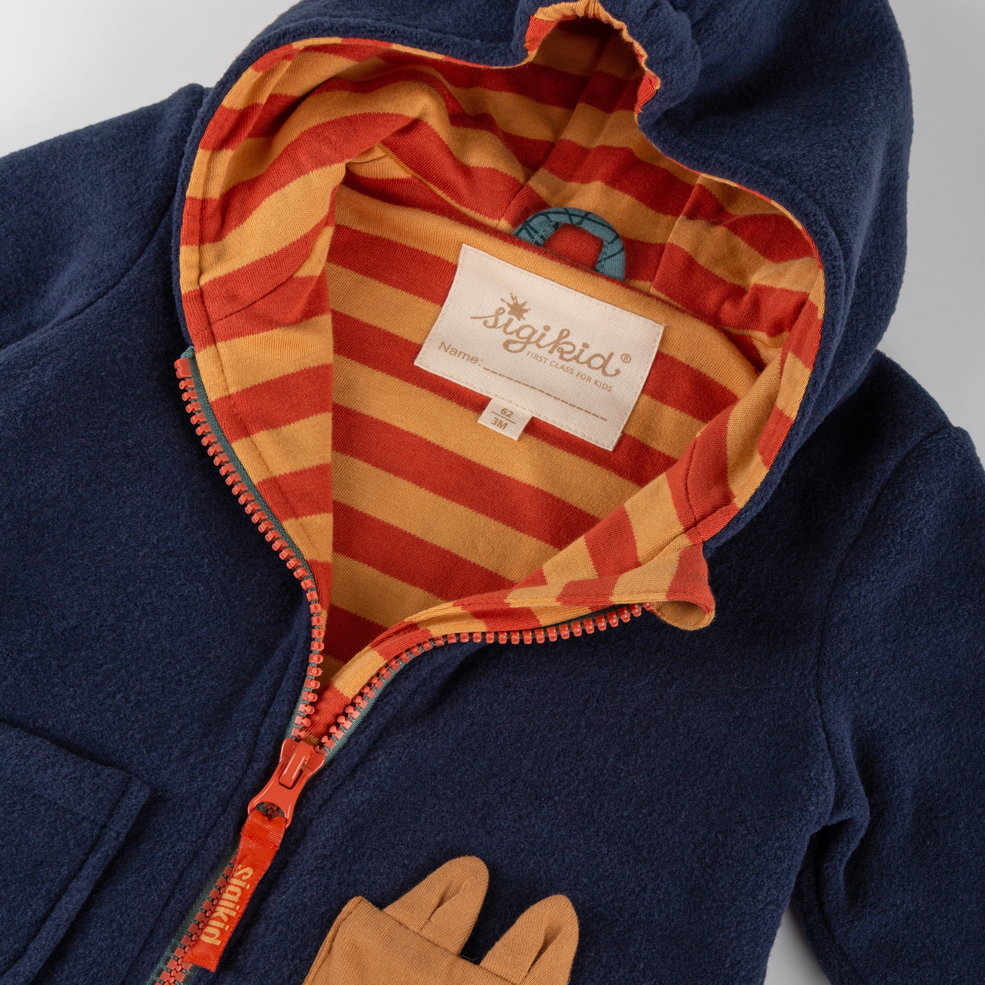 Hooded baby fleece jacket with fox pocket, lined