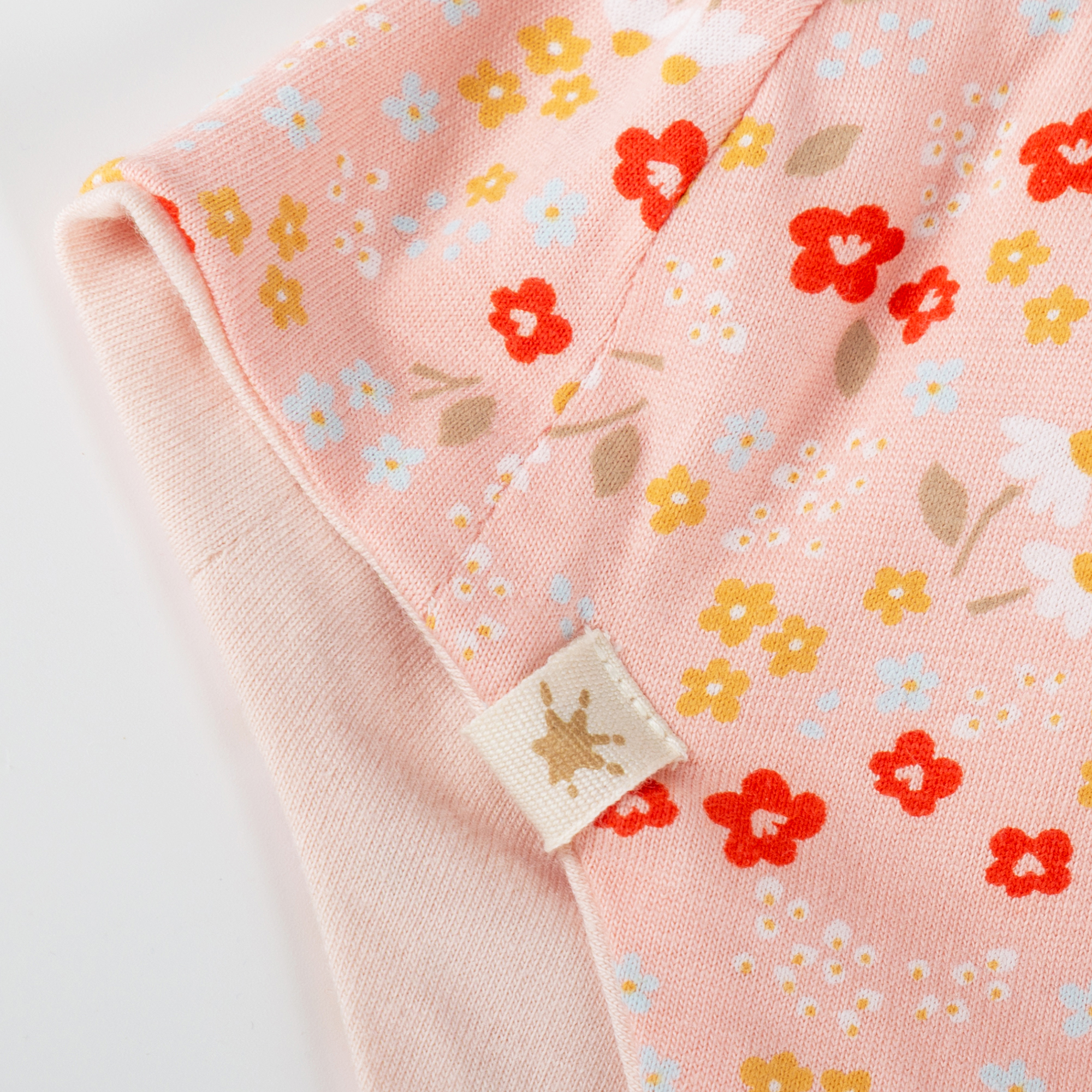 Flowery newborn baby hat with ties, lined