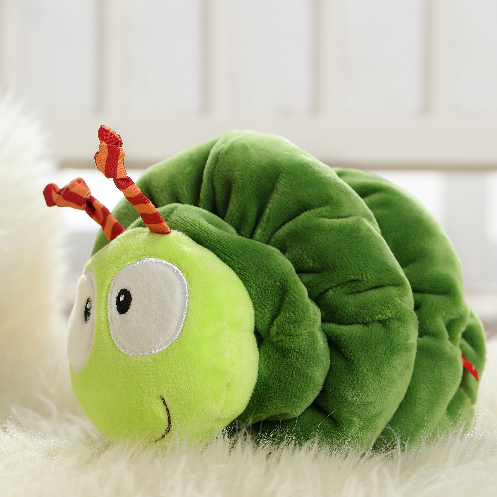Vibrating plush caterpillar