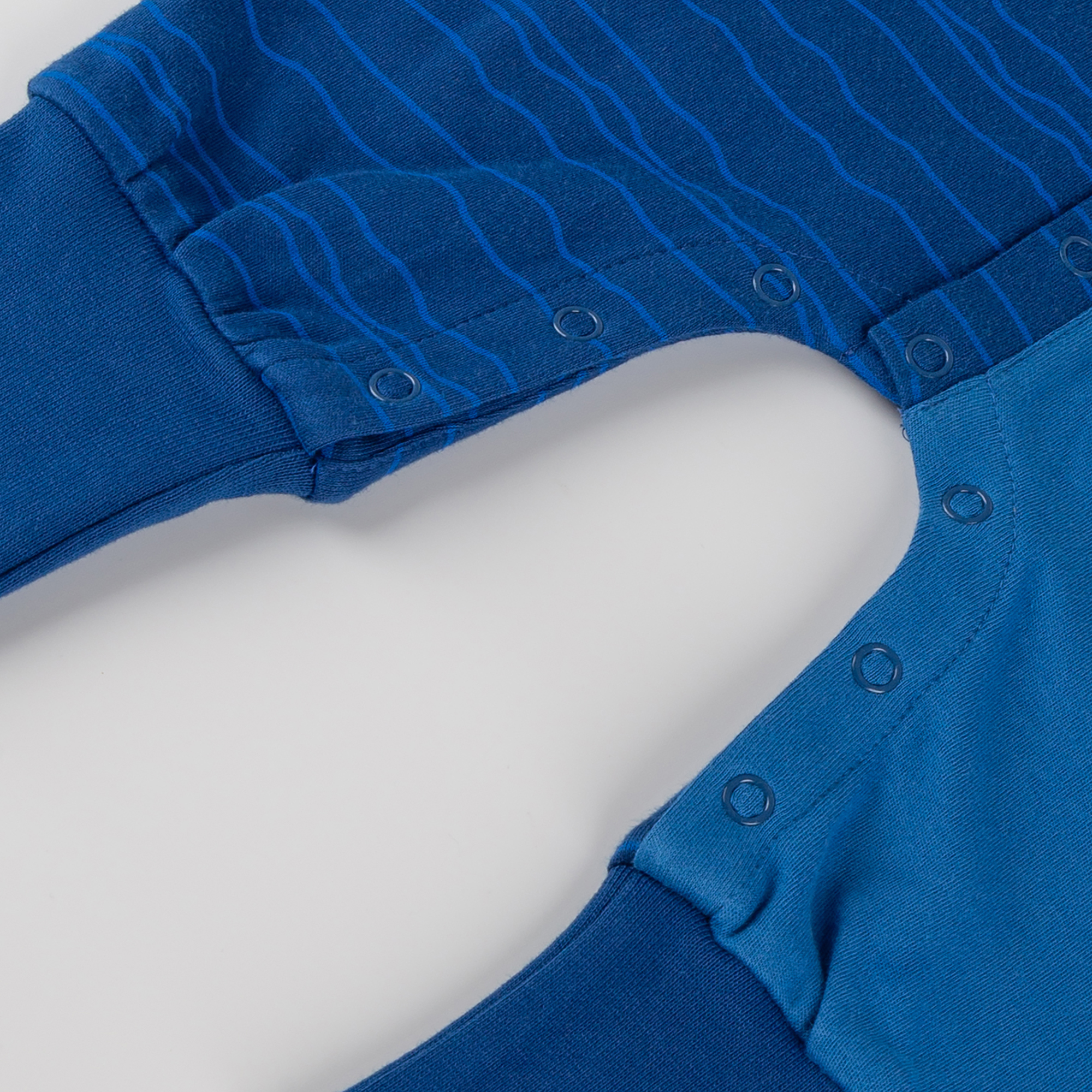Baby Schlaf Overall Faultier, blau bedruckt