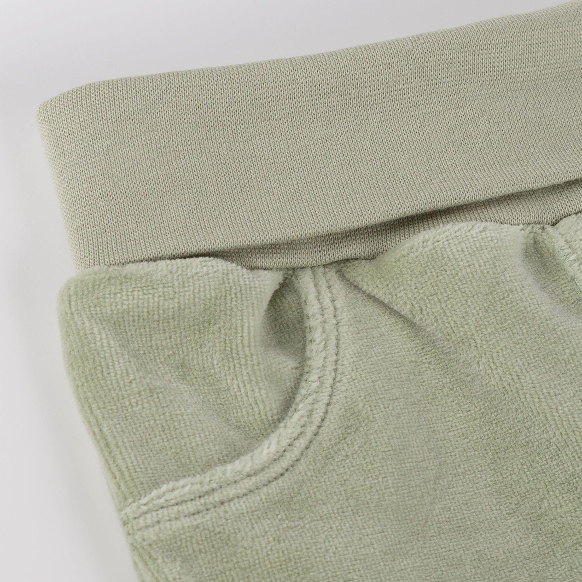 Newborn baby footed velour pants, green