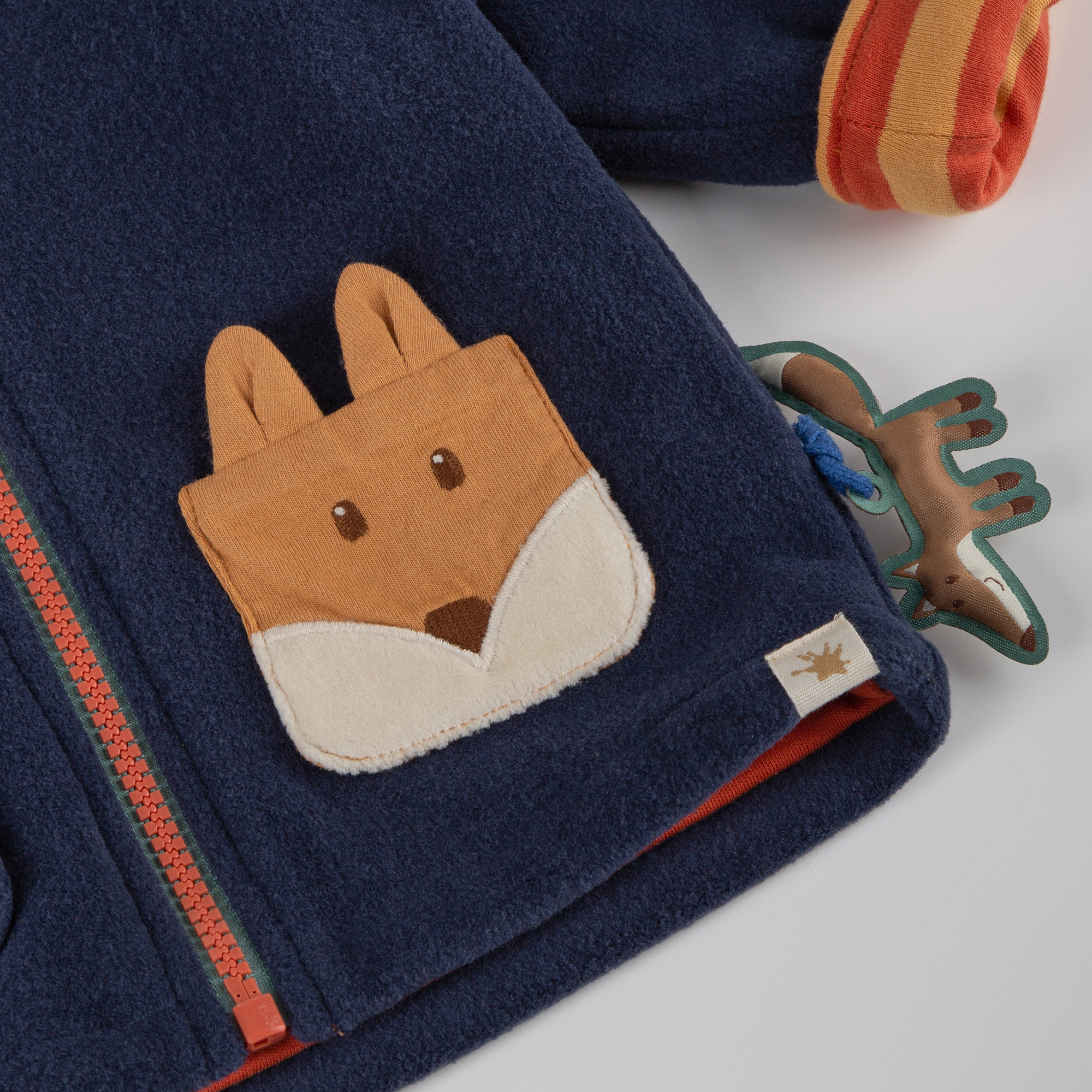 Hooded baby fleece jacket with fox pocket, lined