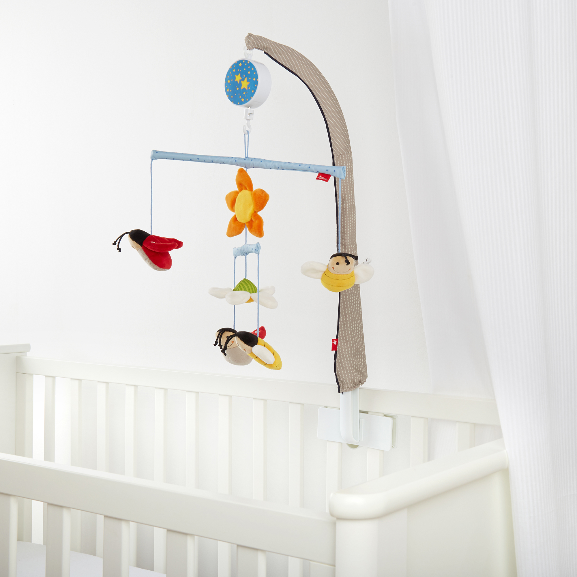 Mobile holder with circling musical box